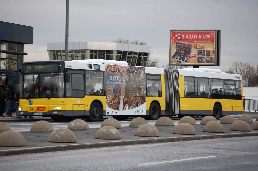 Ein Gelenkbus der Berliner Verkehrsbetriebe (BVG Nr.4031, Typ MAN GN 03 (NG 313)) auf der Linie TXL Richtung Berlin-Alexanderplatz auf der Berliner Beusselbrcke am 20.12.11.