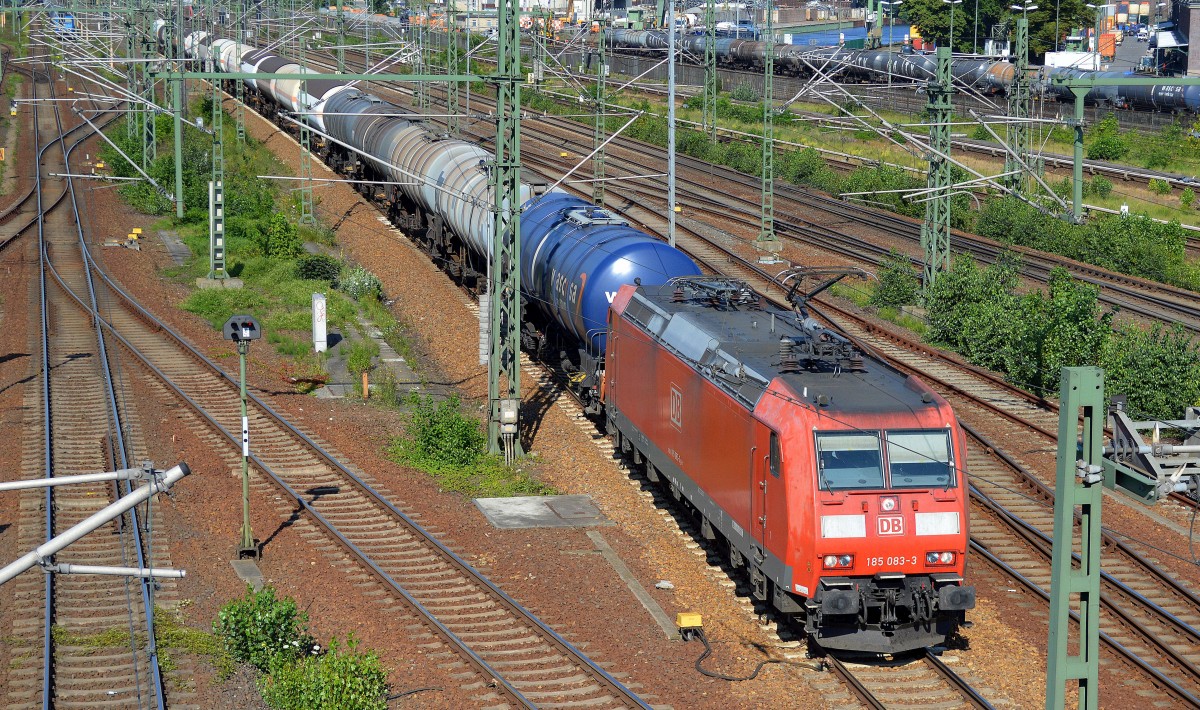 185 083-3 mit Kesselwagenzug (leer) Richtung Stendell am 15.07.15 Berlin-Putlitzbrücke gegenüber dem Westhafen.