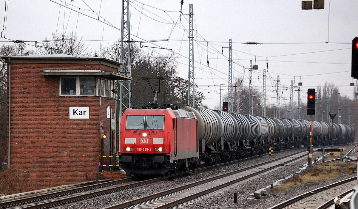 185 385-2 mit Kesselwagenzug Richtung Schwedt am 20.01.14 Berlin-Karow.