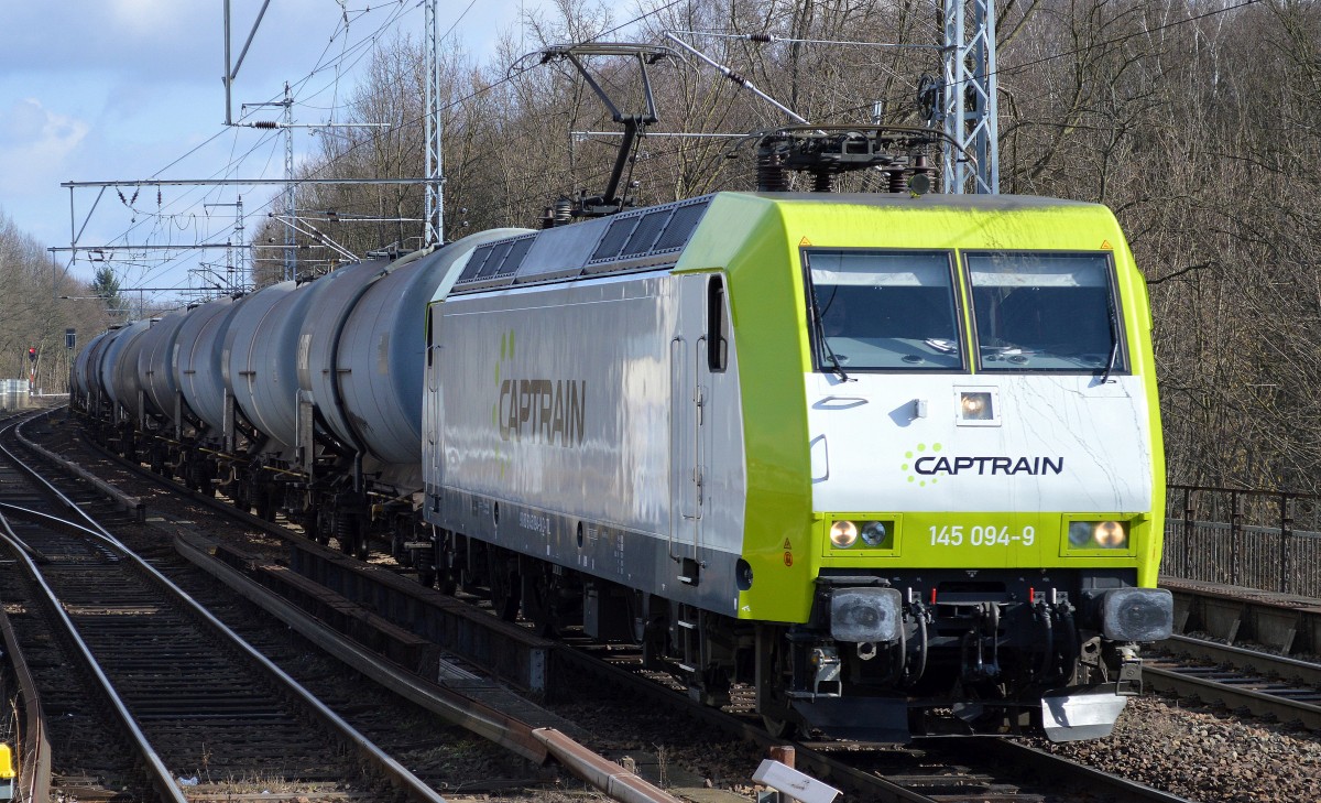 Captrain/ITL 145 094-9 mit Kesselwagenzug Richtung Karower Kreuz in Berlin-Buch, 04.03.15