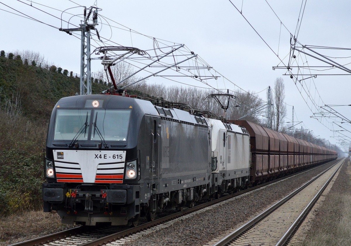 DB Schenker Rail mit X4 E - 615 + X4 E - 611 und Erzzug Richtung Eisenhüttenstadt am 11.03.6 Berlin-Hohenschönhausen.