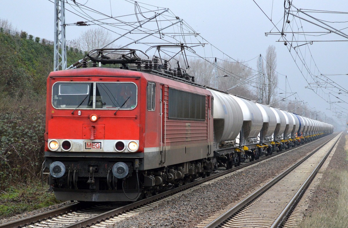 MEG 701 (155 124-1) mit Leerzug Zementstaubwagen Richtung Industrieübergabegebiet Berlin Nordost am 21.01.15 Berlin-Hohenschönhausen.