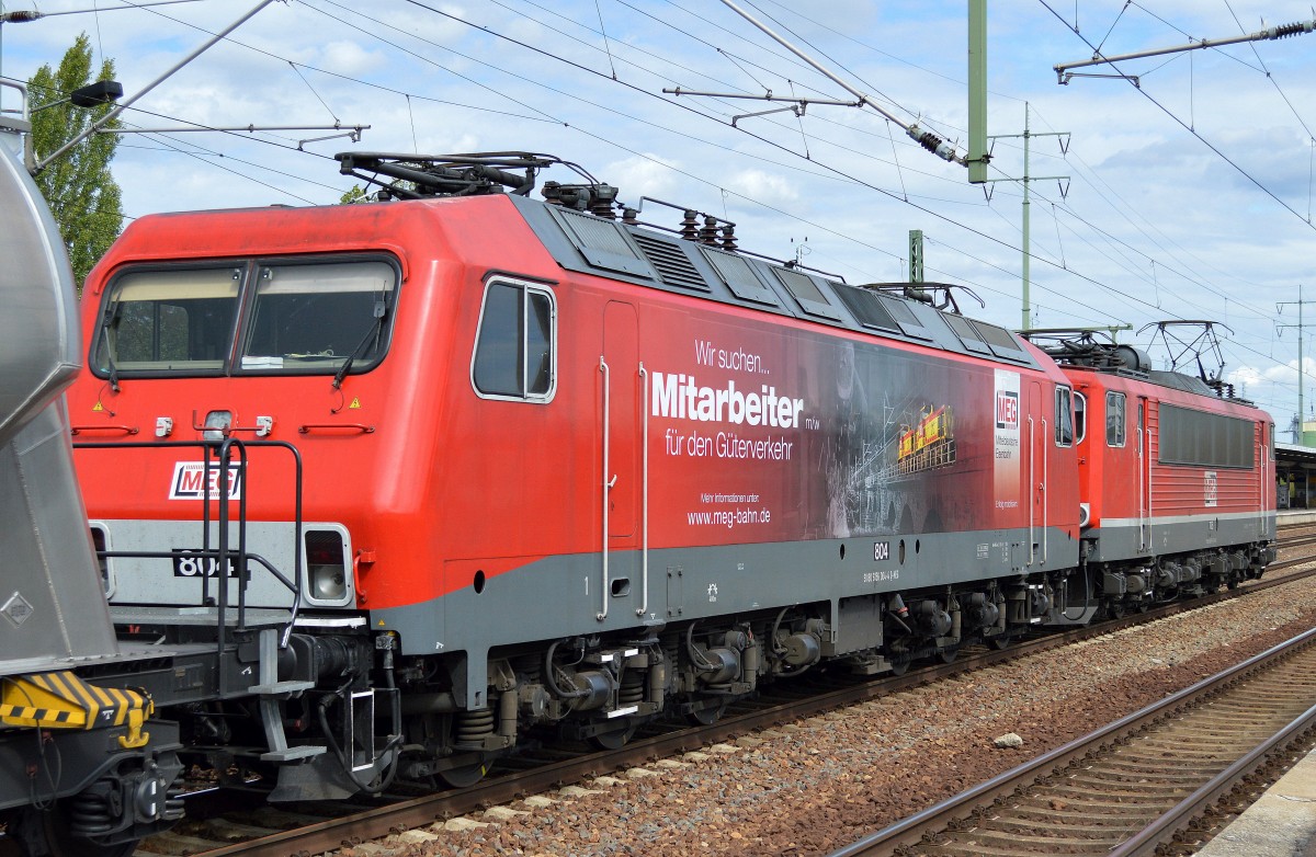 MEG 706 (155 119-1) mit MEG 804 (156 004-4) und Zementstaubzugwagen (leer) am Haken am 08.09.15 Bhf. Flughafen Berlin-Schönefeld.