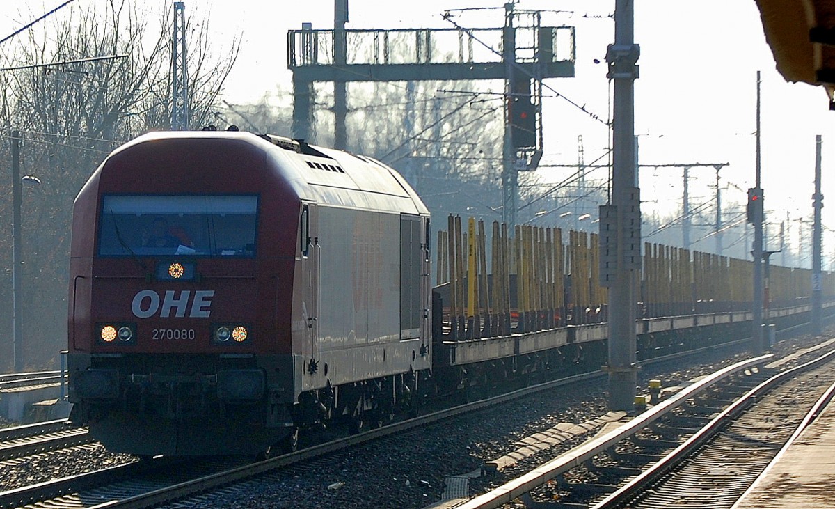 OHE 270080 (223 101-7) mit Ganzzug Holzrungentransportwagen (leer) Richtung Bernau am 05.02.14 Berlin-Blankenburg.