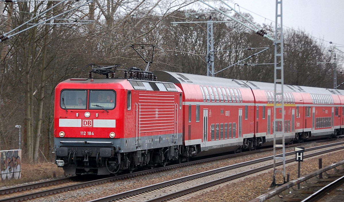 RE5 nach Rostock Hbf. mit 112 184 Richtung Oranienburg, 11.02.14 Mühlenbeck/Mönchmühle b. Berlin.    