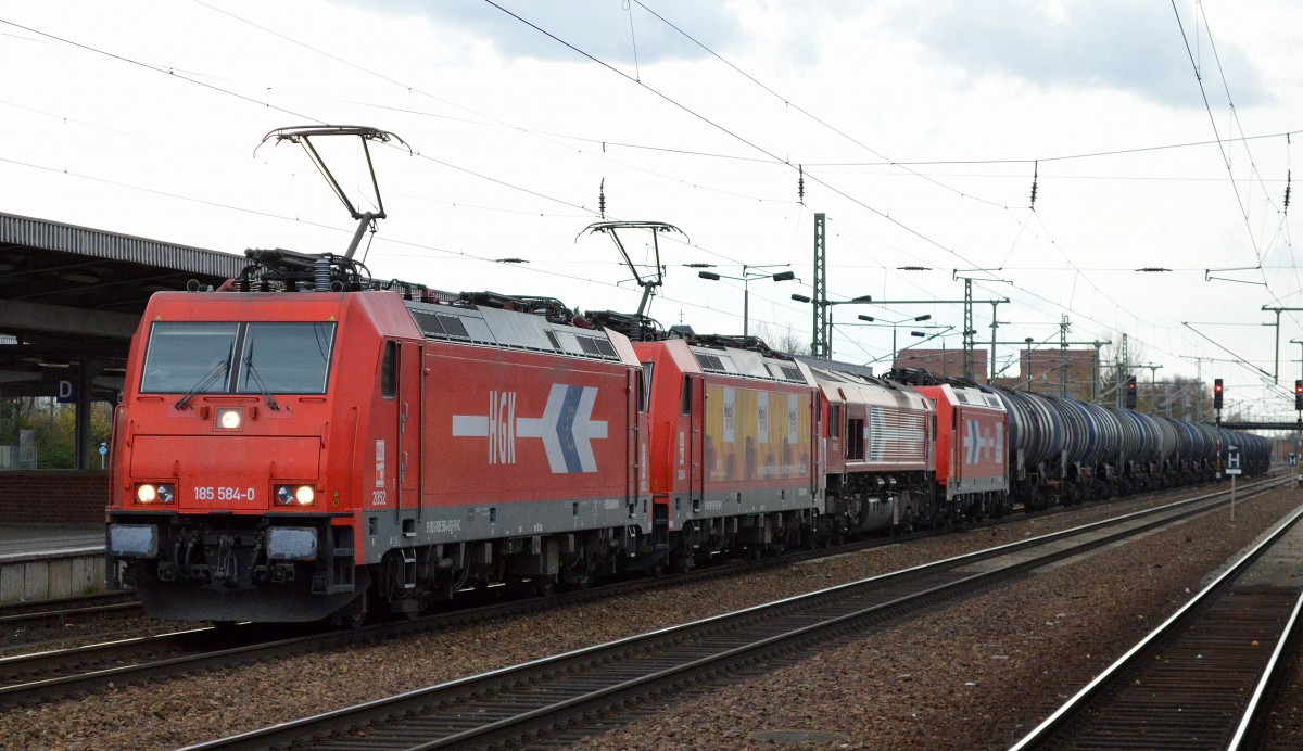 Typischer Zug der Fa. RHC/HGK wenn in Stendell (Schwedt) mehrere Anschlussaufträge warten, die Doppeltraktion 185 584-0 + 185 586-5 mit DE672 und 185 589-9 + Kesselwagenzug (leer) am Haken bei der Durchfahrt Bhf. Flughafen Berlin-Schönefeld.