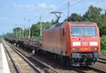 145 079-0 mit einem Gütertransportzug Stahlbrammen am 24.07.15 Berlin-Hirschgarten.