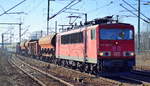 155 065-6 mit einem langen gemischten Güterzug am 15.02.17 Durchfahrt Bf. Flughafen Berlin-Schönefeld.