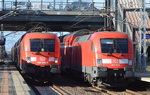 RE1 im Umleitungsverkehr mit Zug + Gegenzug mit 182 022-4 + 182 005 am 04.10.16 Berlin-Hohenschönhausen.
