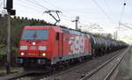 Seit längerem nicht mehr vor der Linse gehabt, die 185 399-3 mit Kesselwagenzug (Benzin) am 23.11.17 Berlin-Hohenschönhausen.