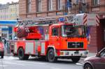 Hubrettungsfahrzeug DLK 23/?? (MAN 14.222 SILENT) der Berliner Feuerwehr beim Lscheinsatz am 10.04.12 Berlin-Moabit-Beusselstr.