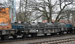 Polnischer Drehgestell-Flachwagen mit Lademulden für Coils der PKP Cargo mit der Nr. 31 RIV MC 51 PL-PKPC 4707 764-0 Smms am 22.02.17 Berlin-Grünau.