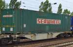 Ein grüner Container vom Intermodal (Reederei) Unternehmen SEAWHEELL IRELAND Ltd. am 03.06.15 Bhf. Flughafen Berlin-Schönefeld. 