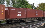 container/523795/containertragwagen-mit-der-nr-33-riv Containertragwagen mit der Nr. 33 RIV 68 D-AAEC 4557 396-1 Sgns7 mit zwei Containern der israelischen Reederei ZIM Integrated Shipping Services Ltd. am 06.10.16 Berlin-Karow. 