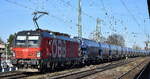getreide-zucker-u-cerealientransporte/909496/oebb-produktion-gmbh-wien-a-mit-ihrer ÖBB-Produktion GmbH, Wien [A] mit ihrer Vectron '1293 119' [NVR-Nummer: 91 81 1293 119-4 A-ÖBB] und einem Getreidezug am 25.02.26 Höhe Bahnhof Magdeburg-Neustadt.