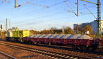 Diverse Loks/587881/locon-mit-der-alpha-trains-1138 Locon mit der Alpha Trains 1138 (275 119-6) und einem recht langen Schotterzug bei untergehender Sonne im Bf. Flughafen Berlin-Schönefeld.