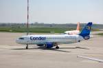 Ein Airbus A320-212 (D-AICF) vom Ferienflieger Condor, am Heckflgel steht auch noch Thomas Cook am 13.04.09 Flughafen Berlin-Schnefeld.