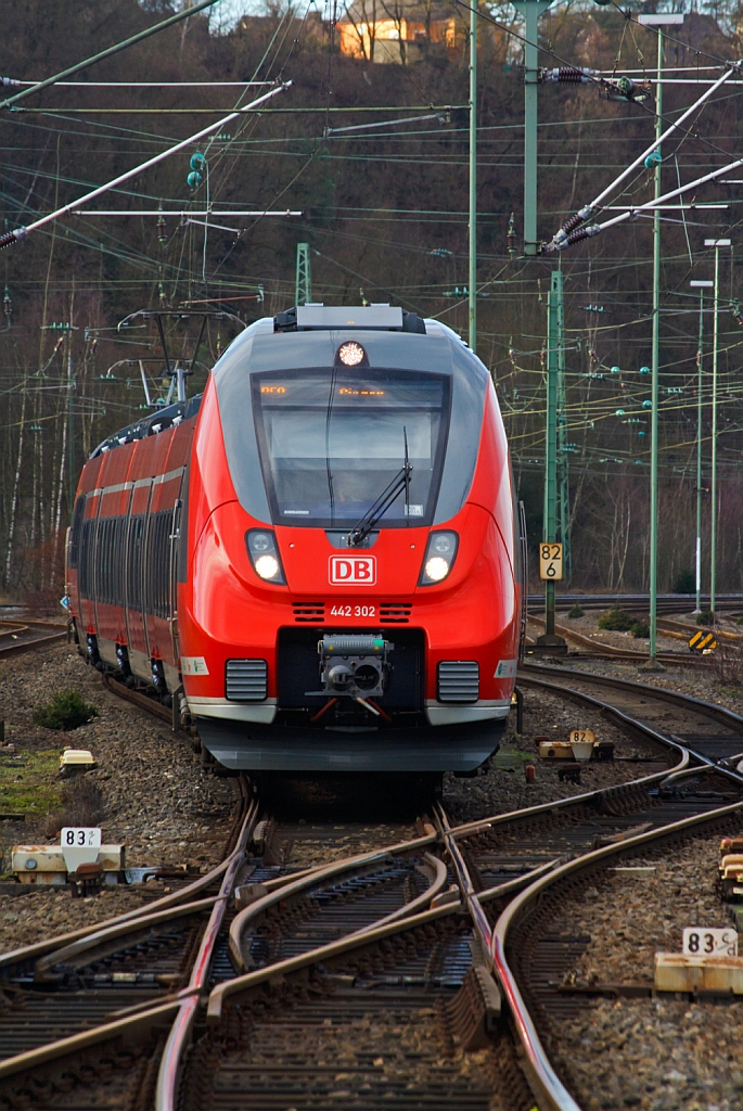 Ein Bombardier Talent 2 - 442 302 (f�nfteilig) und 442 103 (dreiteilig) als rsx – Rhein-Sieg-Express (RE 9) am 29.12.2012 bei der Einfahrt in den Bahnhof Betzdorf/Sieg.