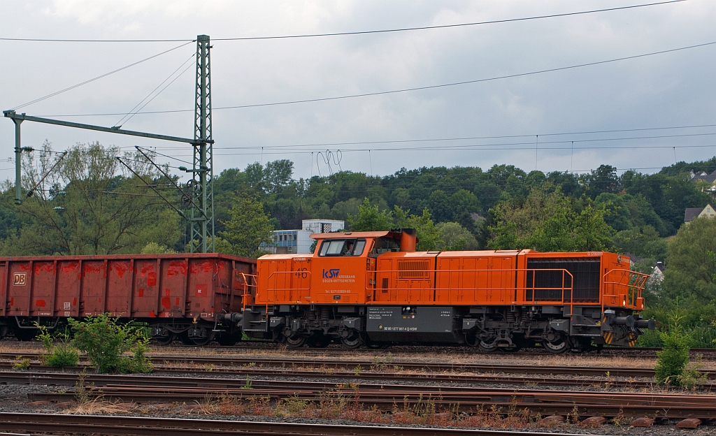 Lok 46 (MaK G 1700 BB) der  Kreisbahn Siegen-Wittgenstein (KSW) f�hrt mit G�terzug am 17.06.2011 in Scheuerfeld/Sieg, in Richtung Siegen.
