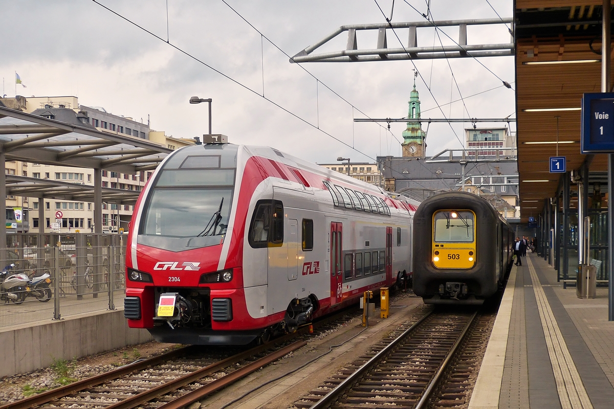 . Am 27.05.2014 reisten wir von Herdorf zur�ck nach Hause und im Bahnhof von Luxemburg hatte ich noch die Gelegenheit den CFL KISS Z 2304 zusammen mit der SNCB Gumminase AM 96 503 abzulichten. (Hans)