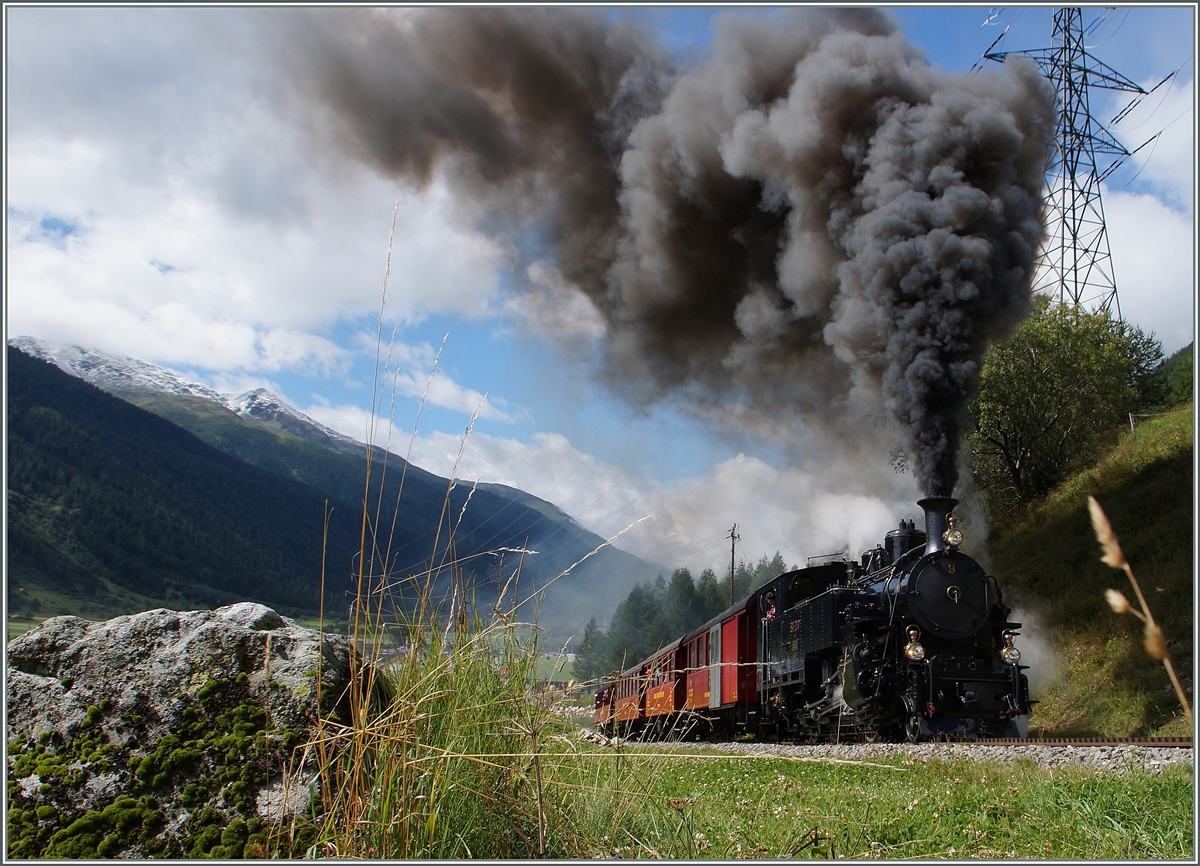 100 Jahre Brig - Gletsch: Die HG 3/4 N� 9 zieht kurz nach Oberwald einen Jubil�ums-Zug Richtung Gletsch.
16. August 2014