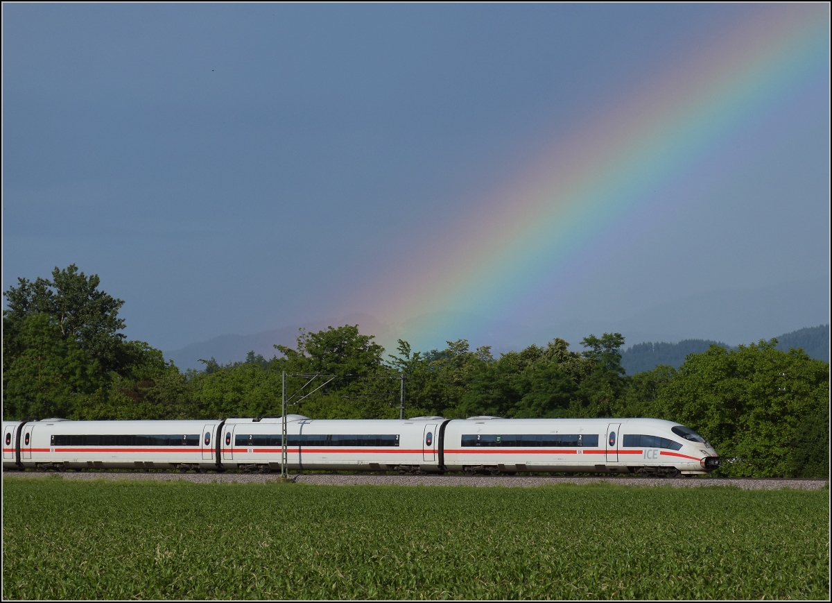403 061 'Celle' mit Regenbogen bei Buggingen. Juni 2022.
