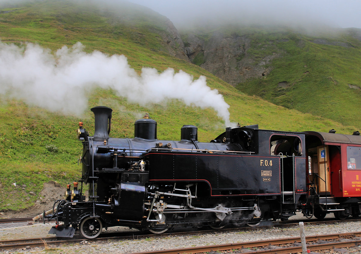 Dampfbahn Furka Bergstrecke: Die HG 3/4 4 (die einzige, die noch bei der ehemaligen F.O. verblieben war) auf der Furka. 23. August 2020  