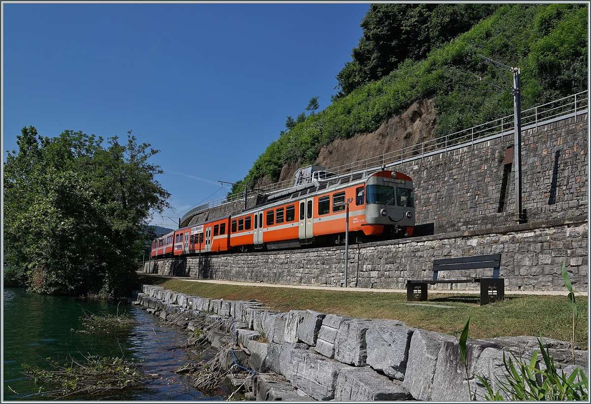 Der FLP Be 4/12 21 LEMA kurz vor Agno auf der Fahrt von Ponte Tresa nach Lugano. 

23. Juni 2021