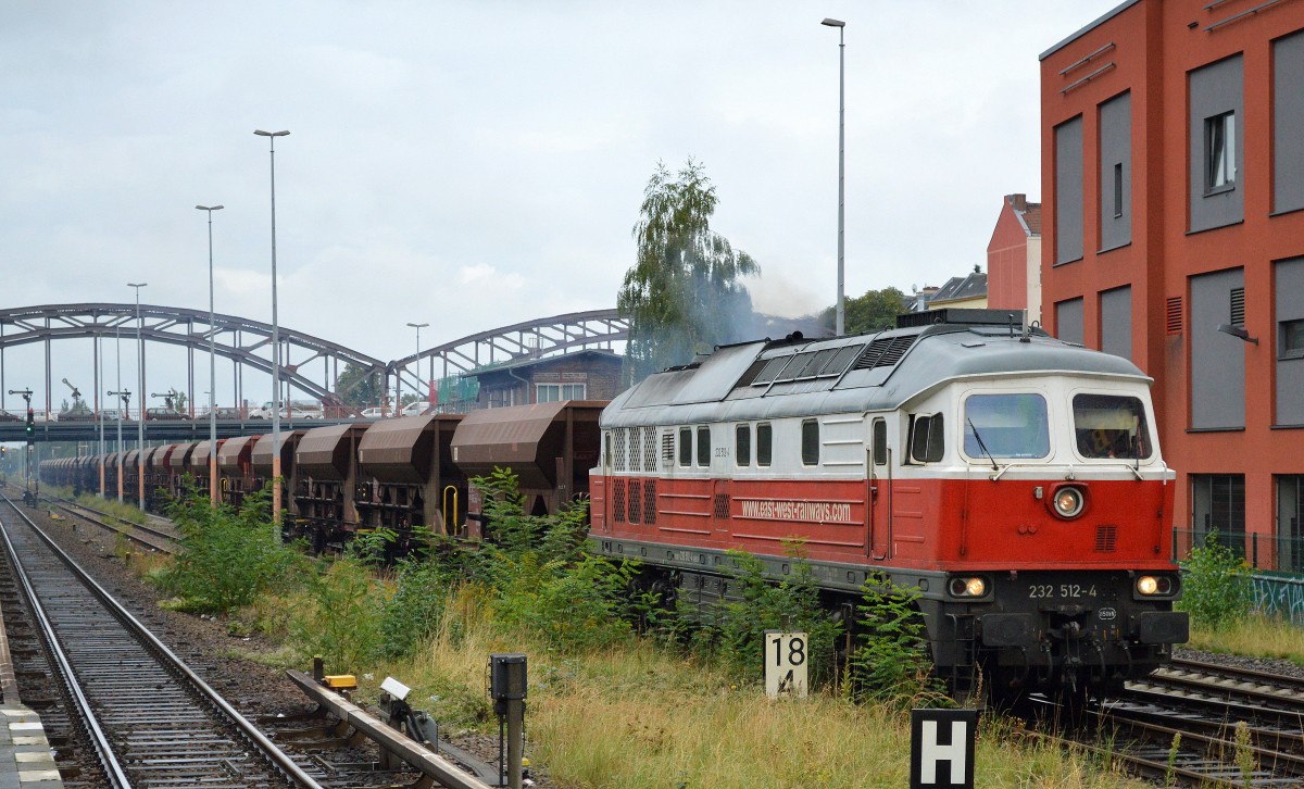 EWR 232 512-4 holt einen Leerzug Schüttgutwagen am Gbf. Berlin-Neukölln ab, 14.09.15 S-Bhf. Berlin Hermannstr.