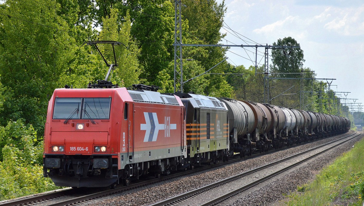 HGK/RHC 185 604-6 hat überraschenderweise vom Mitstreiter HSL Logistik im Bereich Kesselwagenlogistik 285 103-8 am Haken und einen Leerzug Kesselwagen Richtung Stendell (Schwedt) am 21.05.15 Röntgental b. Berlin.