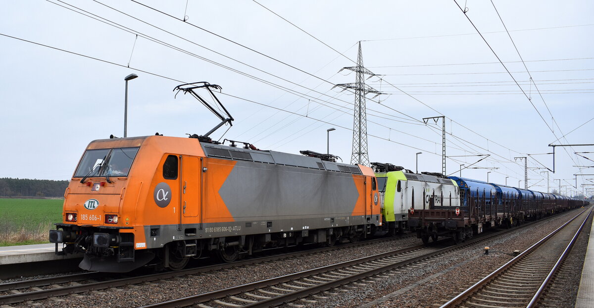 ITL Eisenbahngesellschaft mbH, Dresden [D] mit der geleasten Alpha Trains Lok  185 606-1  [NVR-Nummer: 91 80 6185 606-1 D-ATLU] mit  185 550-1  [NVR-Nummer: 91 80 6185 550-1 D-ITL] und Getreidezug am Haken am 24.03.26 Höhe Bahnhof Rodleben.