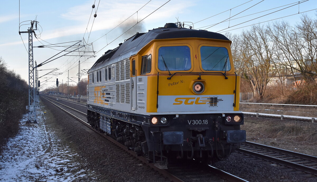 LEG - Leipziger Eisenbahnverkehrsgesellschaft mbH, Delitzsch mit der von der SGL - Schienen Güter Logistik GmbH angemieteten Ludmilla  V 300.18 , Name:  Peter N.  [NVR-Nummer: 92 80 1232 446-5 D-SGL] am 19.02.26 Durchfahrt Bahnhof Berlin-Hohenschönhausen.