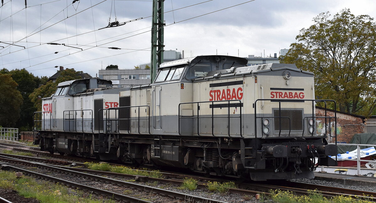 STRABAG BMTI Rail Service GmbH mit ihre beiden V 100 Loks  203 841-2  [NVR-Nummer: 92 80 1203 841-2 D-BRS] +  203 166-4  [NVR-Nummer: 92 80 1203 166-4 D-BRS] am 18.09.25 Höhe Bahnhof Magdeburg-Neustadt.