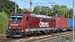 Emons Bahntransporte GmbH, Dresden [D] mit der geleasten ATLU Lok  185 513-9  [NVR-Nummer: 91 80 6185 513-9 D-ATLU] und einem Containerzug am 06.09.26 H�he Bahnhof Leipzig Thekla.