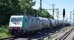 Transchem Sp. z o.o., Włocławek [PL] mit der geleasten ATLU Lok  186 135-0  [NVR-Nummer: 91 80 6186 135-0 D-ATLU] und einem Staubgutzug Richtung Frankfurt/Oder weiter nach Polen am 29.05.26 H�he Berlin Karlshorst.