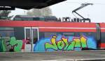 graffiti-an-bahnfahrzeugen/383329/am-131114-an-einem-talent-2 Am 13.11.14 an einem TALENT 2 Triebzug gesichtet, Bhf. Flughafen Berlin-Schönefeld.