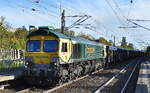Freightliner Deutschland GmbH, Berlin mit der BRLL Class 66 Lok '653-05' (NVR: '92 80 1266 115-5 D-BRLL') und einem Ganzzug Drehgestell-Hochbordwagen mit Plane abgedeckt mit Getreide bef�llt aus Polen am 26.09.26 Durchfahrt Bahnhof Berlin-Hohensch�nh ...