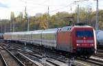 101 128-7 mit Berlin-Warschau Express Zuggarnitur am 29.10.13 Berlin Greifswalder Str.