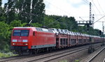 145 059-2 mit einem langen PKW-Transportzug diverser TOYOTA Modelle aus Richtung Berlin-Grunewald Höhe Berlin-Jungfernheide, 01.06.16