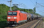 185 016-3 mit Kesselwagenzug am 29.05.17 Berlin-Hohenschönhausen.