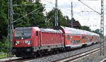 DB Regio AG - Region Nordost, Fahrzeugnutzer: Regionalbereich Berlin/Brandenburg, Potsdam mit ihrer  147 008  [NVR-Nummer: 91 80 6147 008-7 D-DB] und dem RE3 nach Stralsund Hbf. am 15.06.26 H�he Berlin-Buch.
