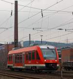 Der Dieseltriebwagen 640 012 (ein Alstom Coradia LINT 27) der 3-L�nder-Bahn als RB 93 (Rothaarbahn) Bad Berleburg - Kreuztal - Siegen Hbf, hat am 03.03.2013 den Bf Siegen-Geisweid verlassen und f�hrt