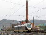   Bei leichtem Regen fährt am 10.01.2015 der ET 22 2101 (94 80 0426 100-4 D-ABRN / 94 80 0826 100-0 D-ABRN), ex ET 22 001, ein 2-teiliger Stadler Flirt der Abellio Rail NRW als RB 91