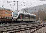   Bei leichtem Regen fährt am 10.01.2015 der ET 23 2107 (94 80 0427 106-0 D-ABRN / 94 80 0827 106-6 D-ABRN / 94 80 0427 606-9 D-ABRN), ex ET 23007, ein 3-teiliger Stadler FLIRT der Abellio Rail