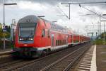   Steuerwagen voraus f�hrt der RE 30  Main-Weser-Express , Verbindung Frankfurt (Main) Hdf - Gie�en - Marburg Hbf - Treysa - Kassel Hbf, am 15.08.2014 in den Bahnhof Butzbach ein.