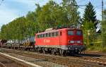   Die 140 600-8 der DB Schenker Rail Deutschland AG, ex DB E 40 600, beim nachschieben eines schweren Güterzuges am 18.07.2014 von Kreuztal in Richtung Welschen Ennest.