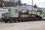   Detailbild von dem 20-achsigen Tragschnabelwagen der Gattung Uaai 687.9 (84 80 996 0 003-5 D-AMPR) der Amprion GmbH beladen mit einem 150 000 kVA Wandertransformator (Trafo 211) der Trafo-Union