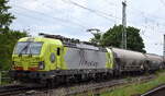 RheinCargo GmbH & Co. KG, Neuss [D] mit der geleasten ATLU Vectron  7193 105  [NVR-Nummer: 91 80 7193 105-2 D-ATLU] und einem Staubgutzug (Braunkohlestaub) am 21.05.26 H�he Bahnhof Magdeburg-Neustadt.