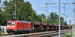 DB Cargo AG, Mainz [D] mit ihrer   185 148-4  [NVR-Nummer: 91 80 6185 148-4 D-DB] und einem Schotterzug am 18.06.26 H�he Leipzig-Thekla.