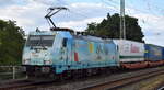 private-evu/888006/hsl-logistik-gmbh-hamburg-tiefstack-d-mit HSL Logistik GmbH, Hamburg-Tiefstack [D] mit der geleasten Akiem Lok '186 364-6' [NVR-Nummer: 91 80 6186 364-6 D-AKIEM] und einem KLV-Zug am 10.07.25 Höhe Bahnhof Magdeburg-Neustadt.